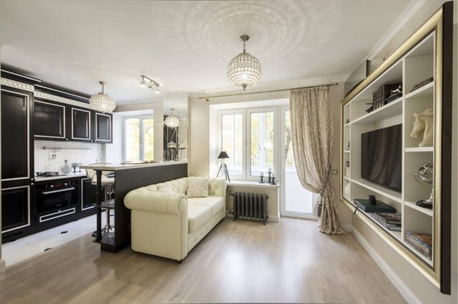 Conception d'un appartement d'une pièce avec une petite cuisine et un salon Conception d'un appartement d'une pièce avec une petite cuisine et un salon